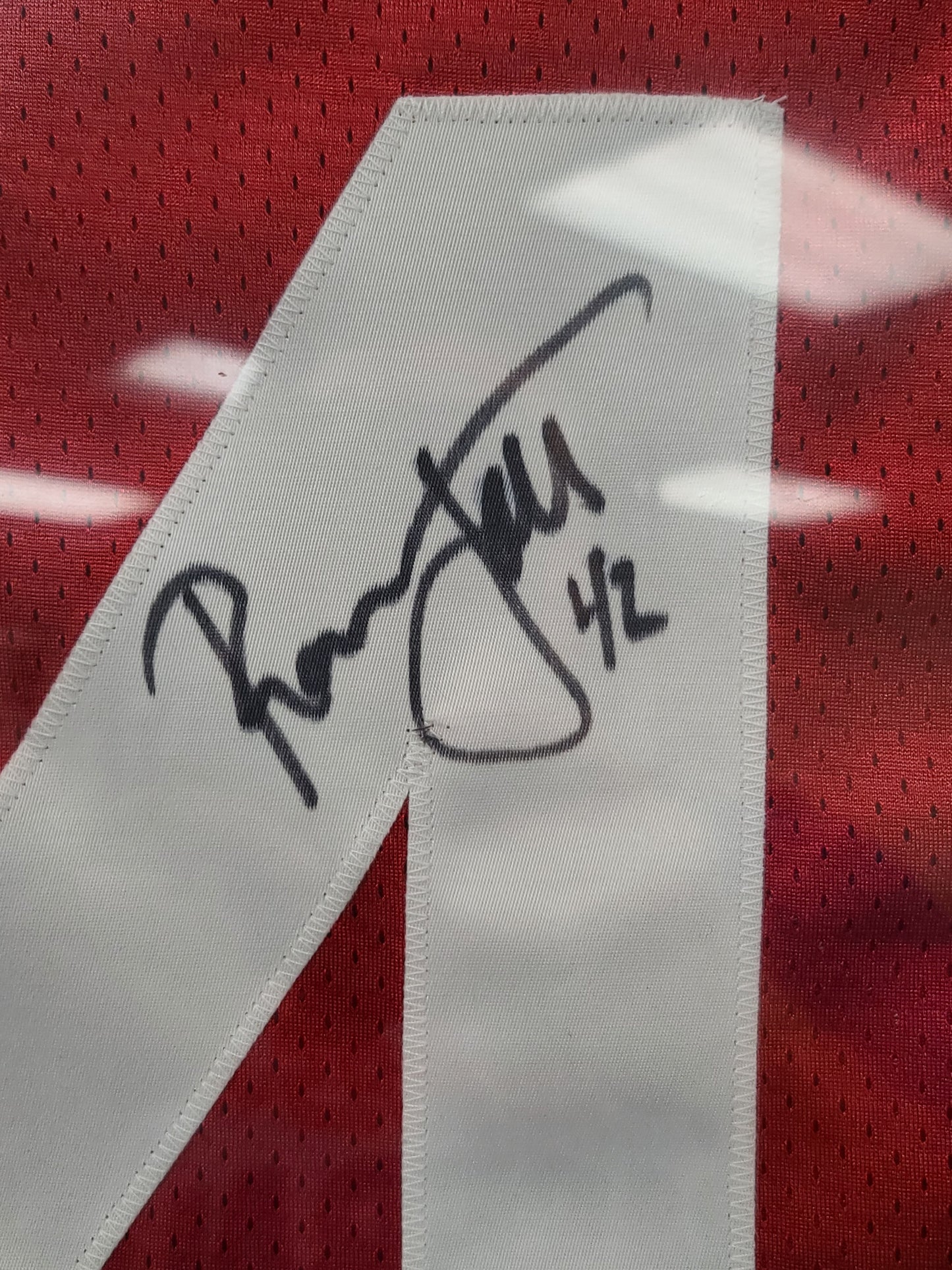 Signed and Framed Hall of Famer Ronnie Lott #42 Jersey – The Signature of a Defensive Legend