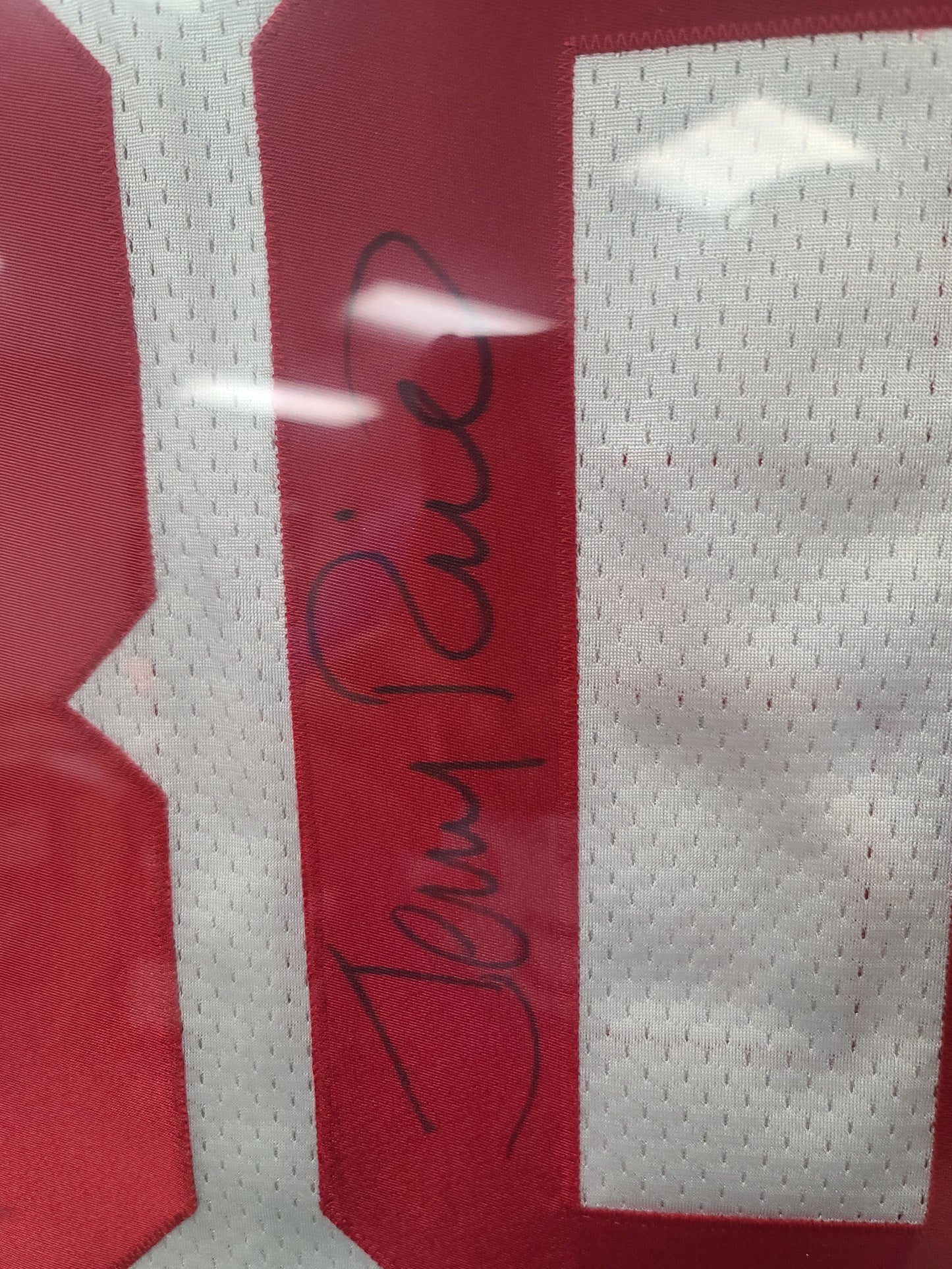 Framed Autographed Jerry Rice Jersey - Own a Piece of Football History